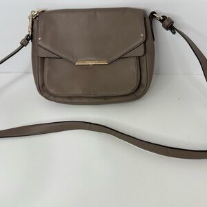 Coach Brown Crossbody Bag with Flap Closure and Adjustable Strap